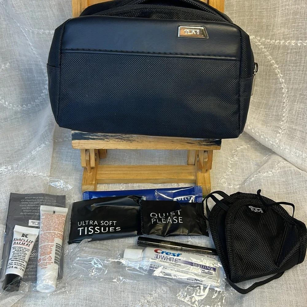Tumi NWT cosmetic travel bag filled with goodies all new in packages